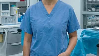 A specialist practitioner in a operating theatre.